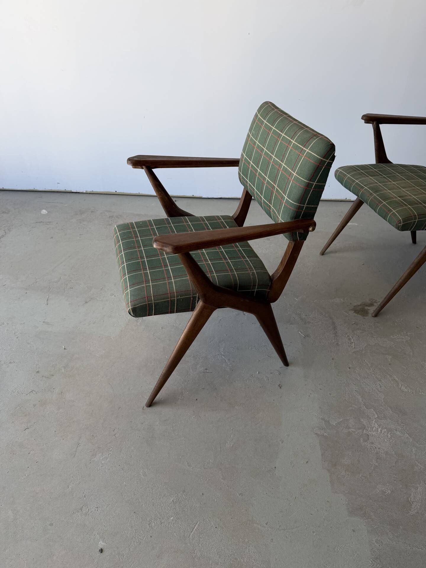 Pair of armchairs with a Scandinavian design in vintage teak from the 1960s.