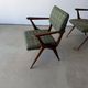 Pair of armchairs with a Scandinavian design in vintage teak from the 1960s.