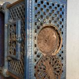 Cast iron and blue ceramic wood stove, from the Chauffette brand