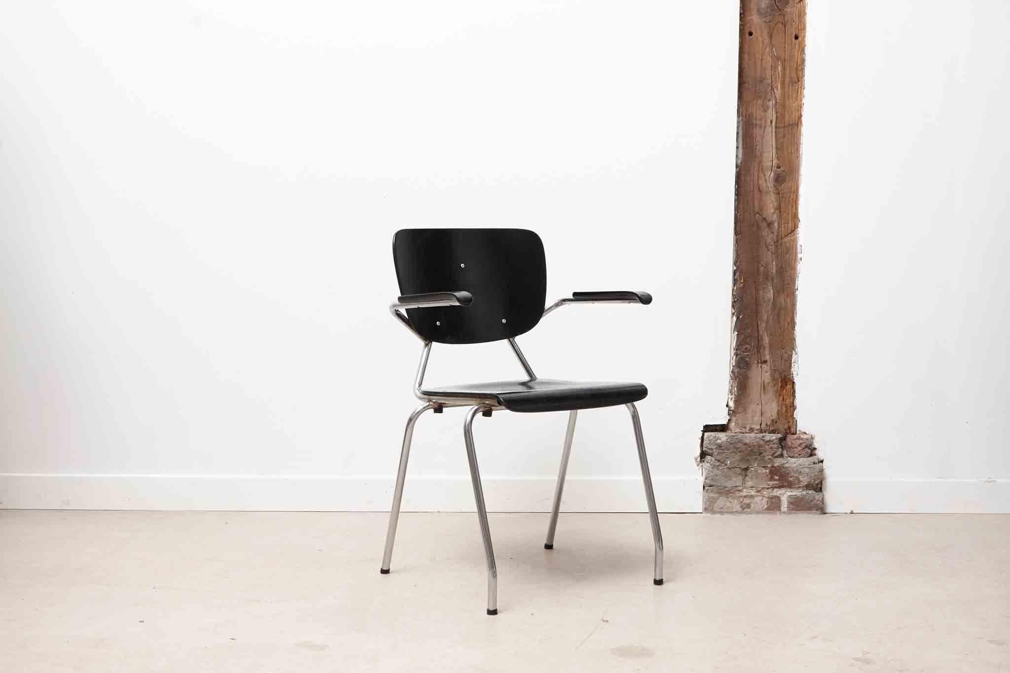 Vintage chair Kho Liang Black and metal with armrests