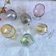 6 vintage glasses of iridescent colors