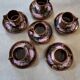 Six cups and saucers Vallauris glazed ceramic in brown and old pink.