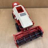 Red combine harvester