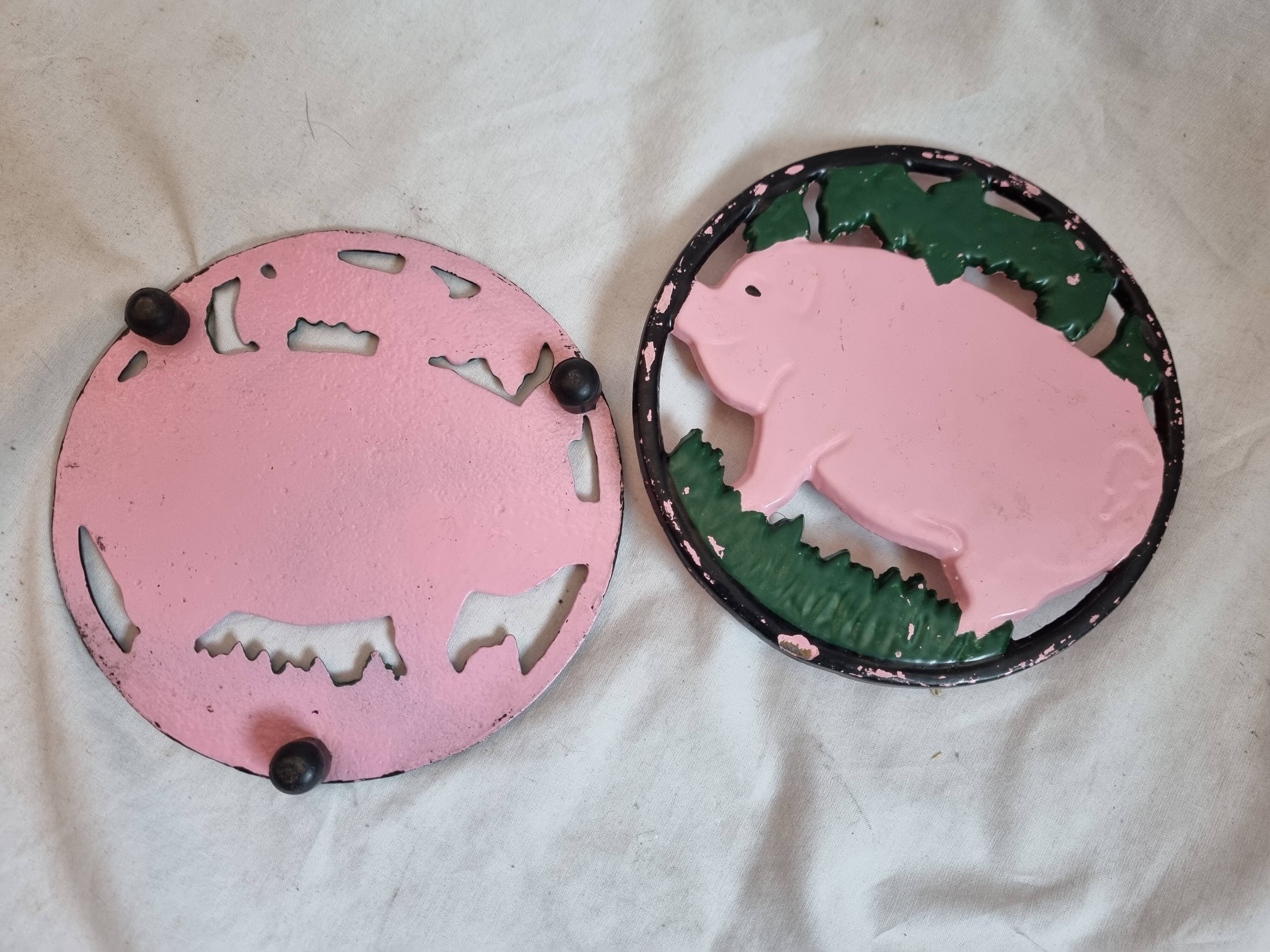 Cast iron underside, pink pig