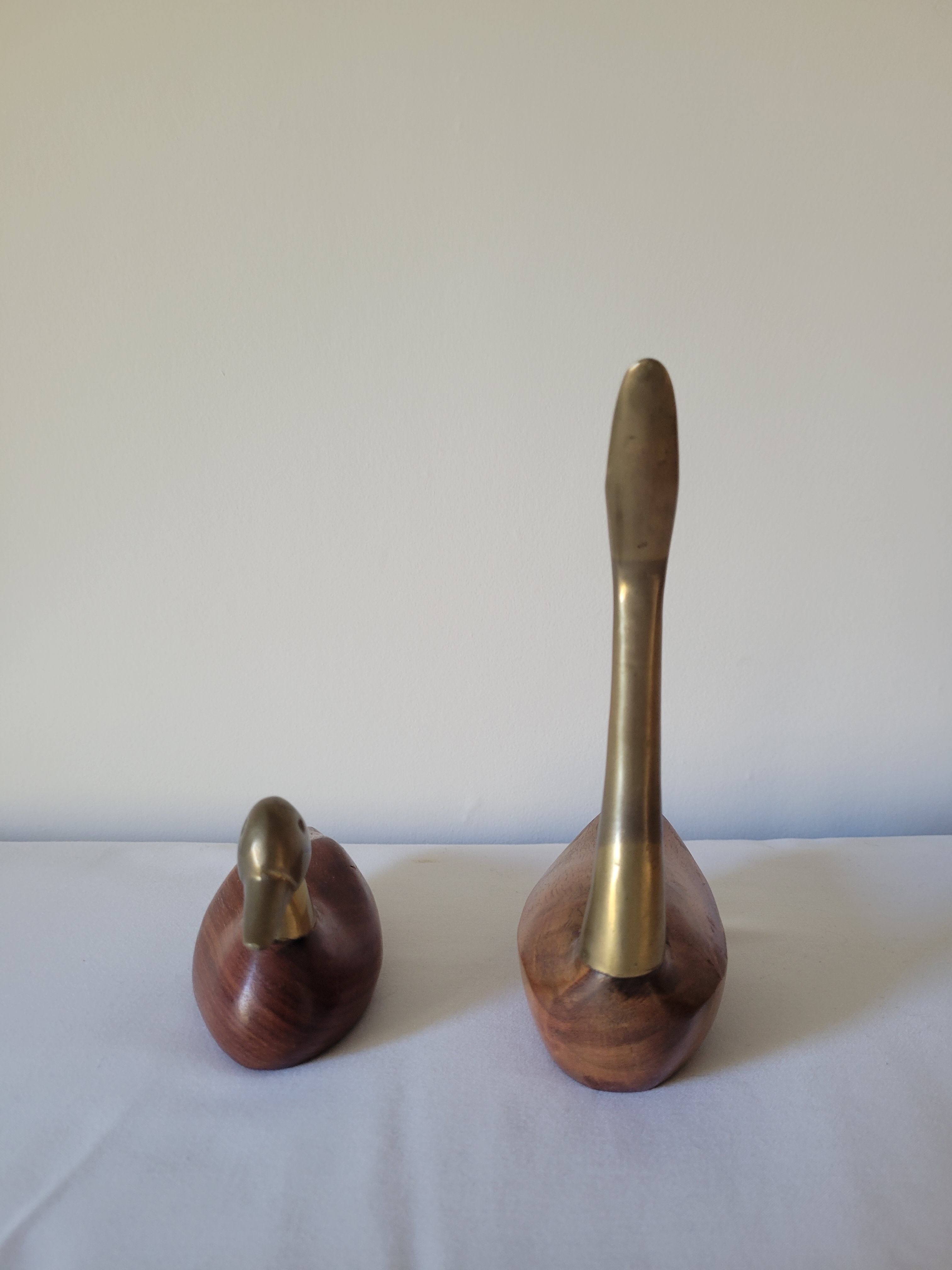 Duck and swan in brass and wood