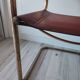 B34 armchairs, cognac leather and gilding