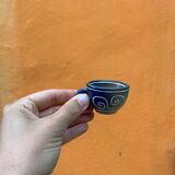 Celtic pattern bottle and mini cups