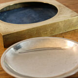 Picks up brass counter money