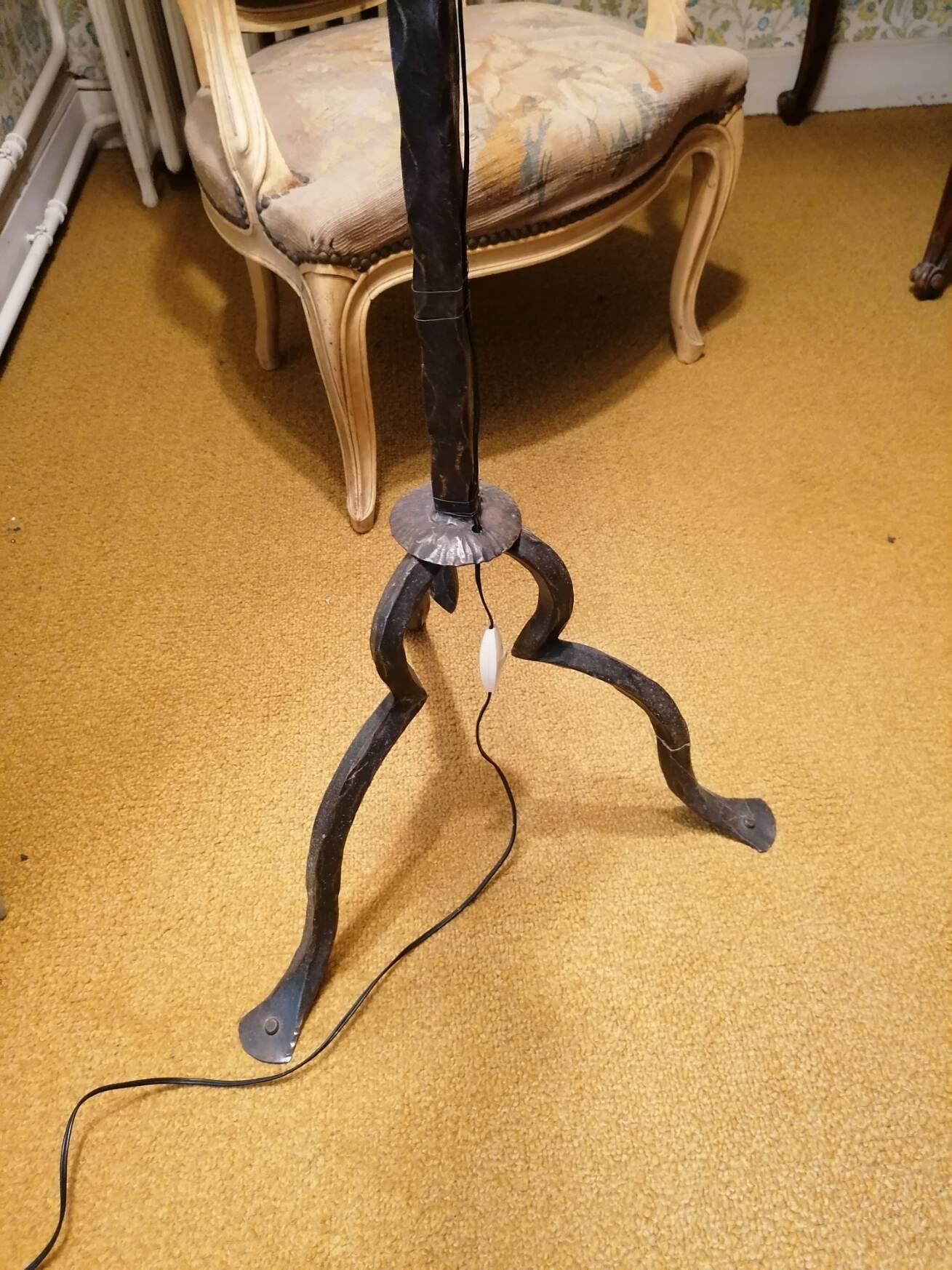 Wrought iron floor lamp.