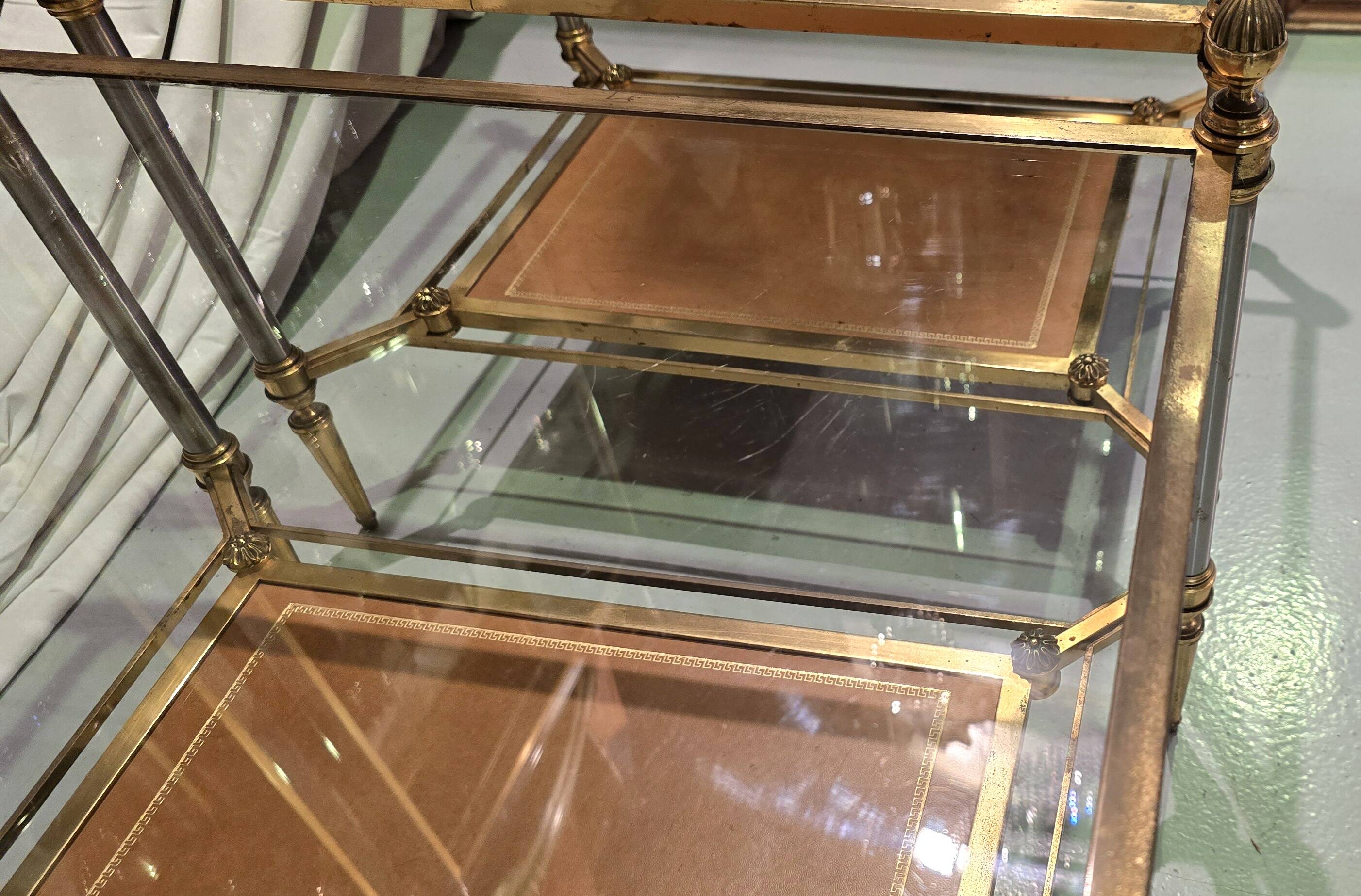 Pair of side tables attributed to Maison Jansen, circa 1950–1960.