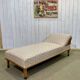 English daybed from the early 20th century in oak, some stains on the fabric