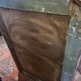 Golden mirror with a flute-playing angel