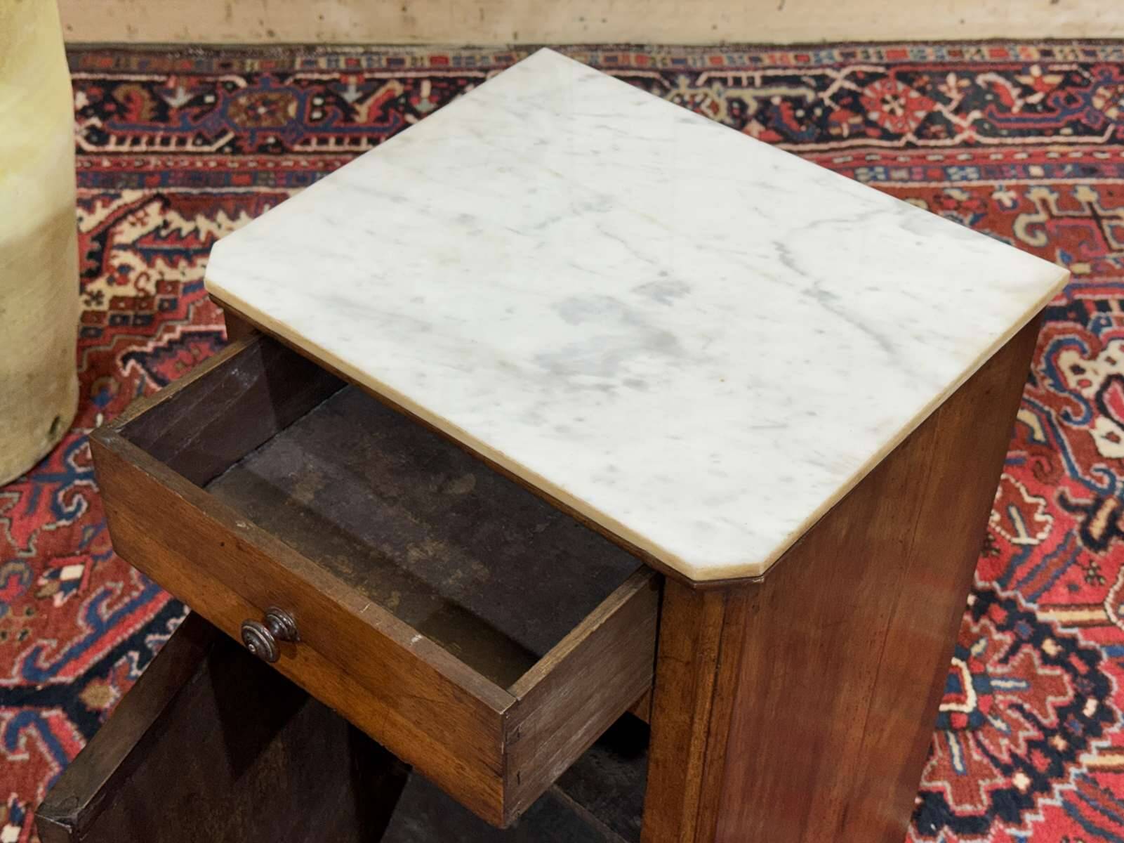 Nightstand in walnut with a white marble top, 19th century.