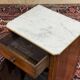Nightstand in walnut with a white marble top, 19th century.