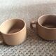 Duo of sandstone cups