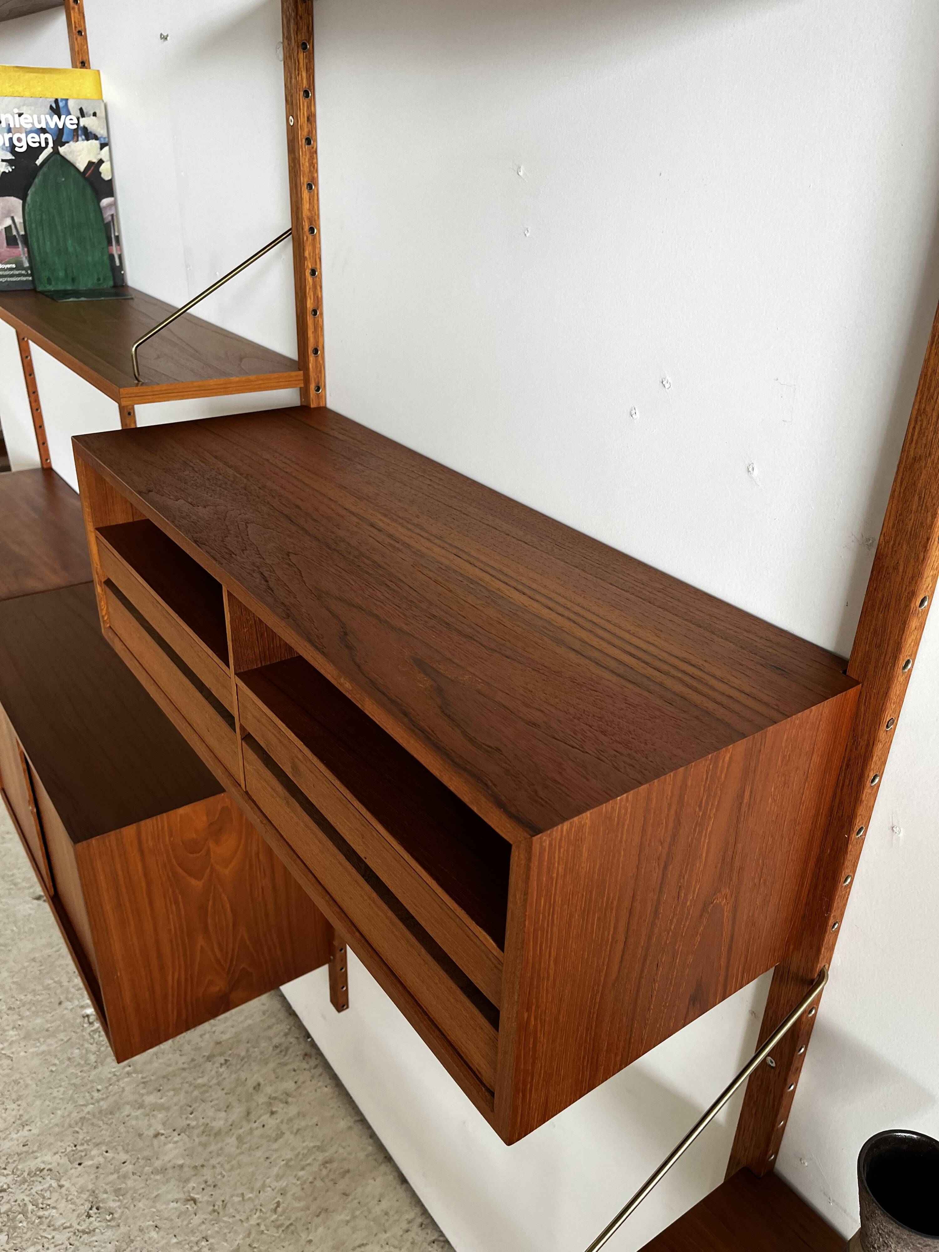 A wall unit with 4 compartments by Poul Cadovius, Denmark, 1960s.