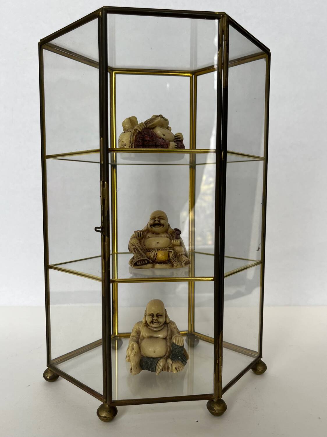 Small glass shelf on feet