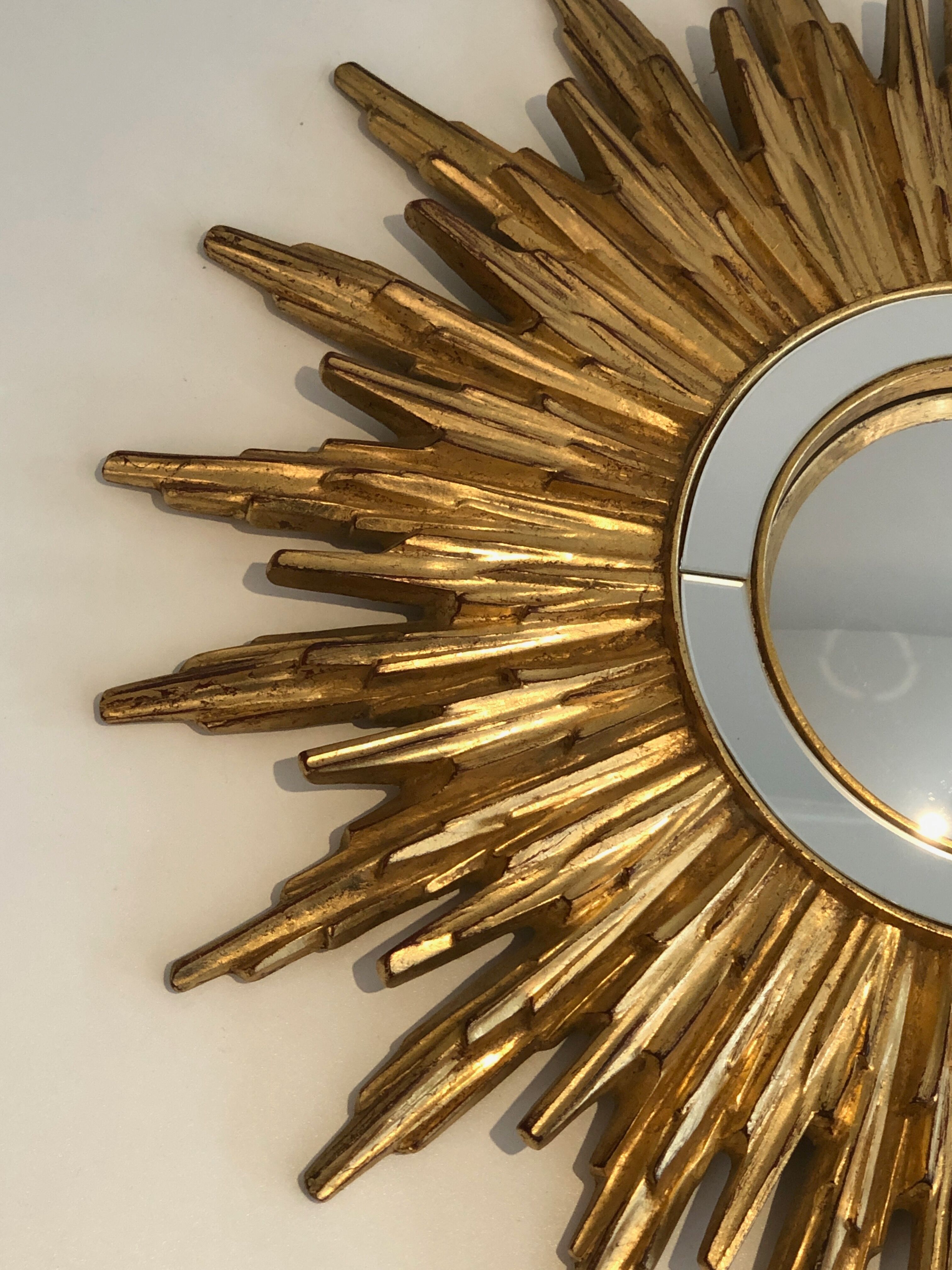 Sun mirror in golden resin 50cm