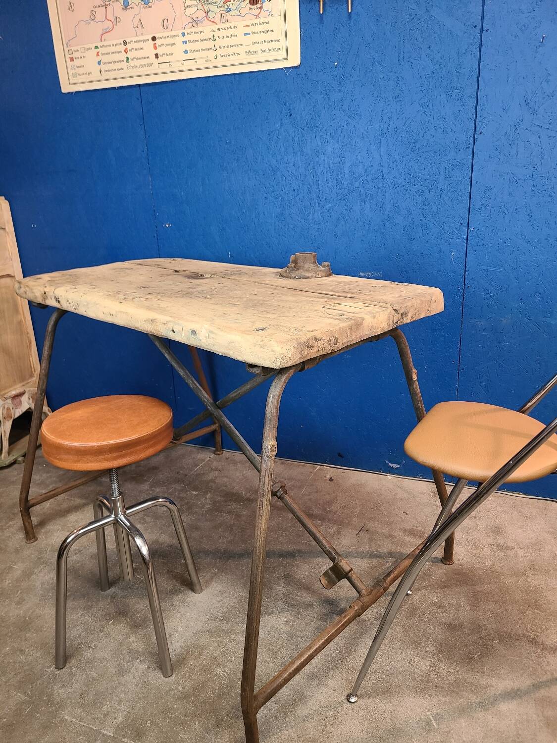 Vintage workbench circa 1930, folding metal leg.