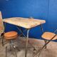 Vintage workbench circa 1930, folding metal leg.