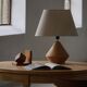 Sculptural Danish modern table lamp in wood by Kirk, 1980s.