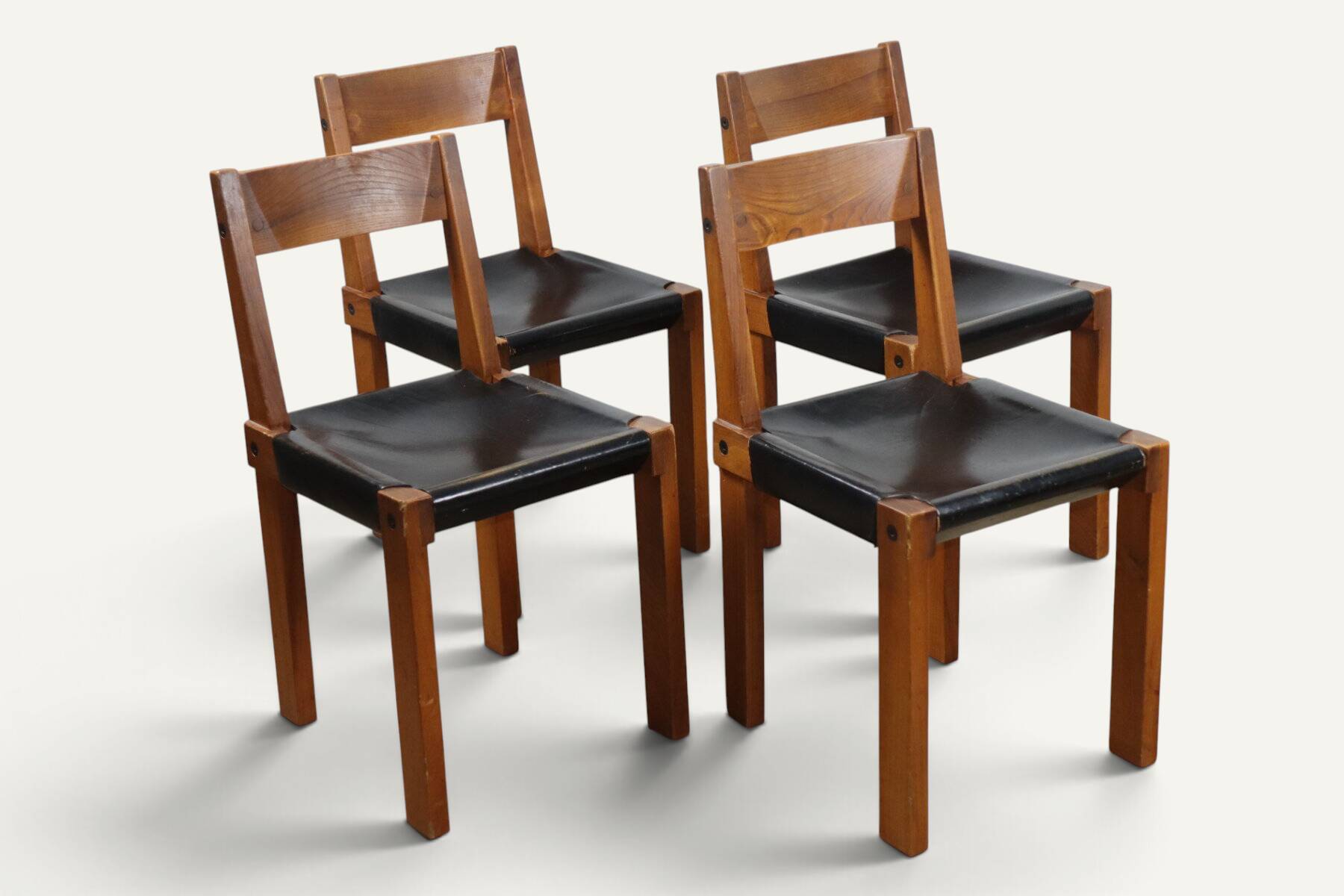 Set of 4 S24 chairs by Pierre Chapo – Solid elm and black leather – 1970