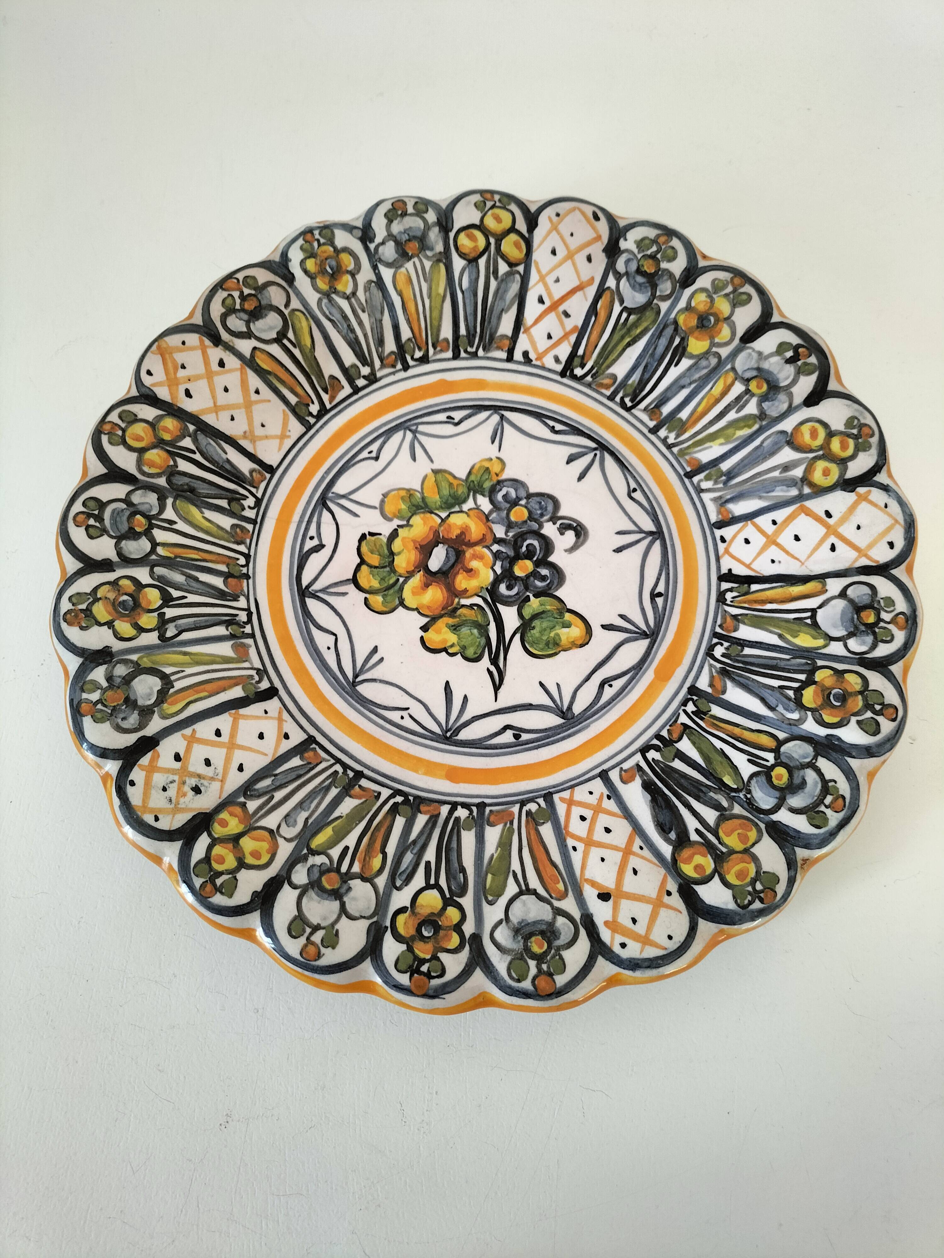 Set of four floral plates Longwy Toledo Talavera Sarreguemines LB