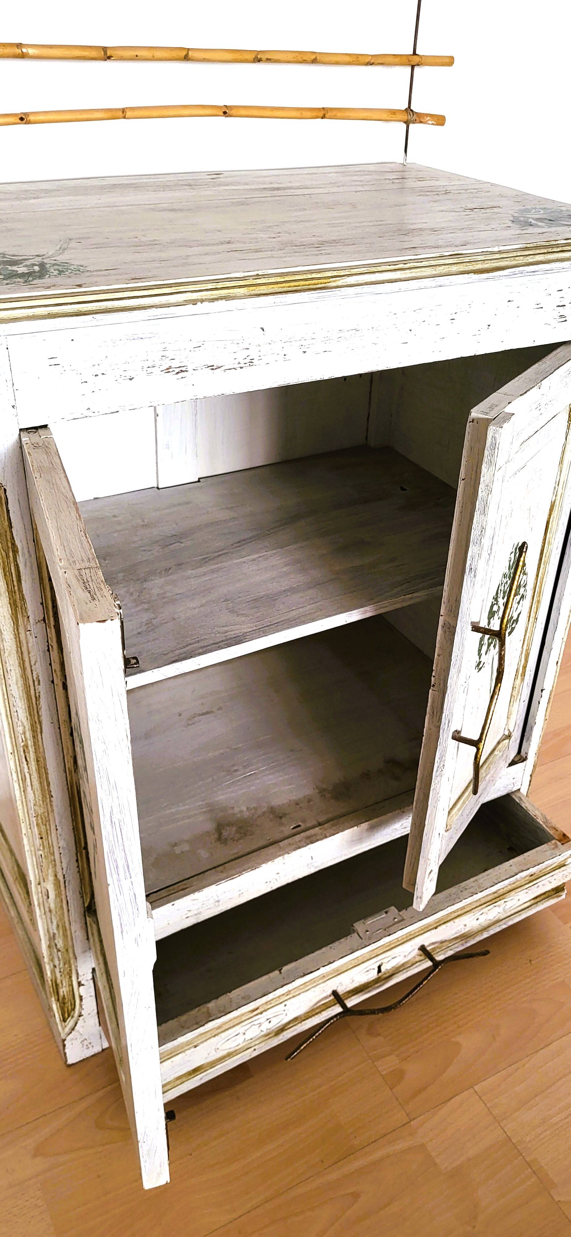 Elegant small patinated sideboard