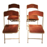 Set of four folding metal and velvet chairs