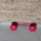 Set of 4 red metal coat hooks