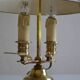 hot water bottle lamp with 2 bronze lights and burgundy sheet metal lampshade