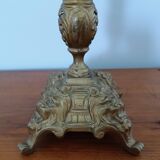 Bronze candlestick with lion head decoration