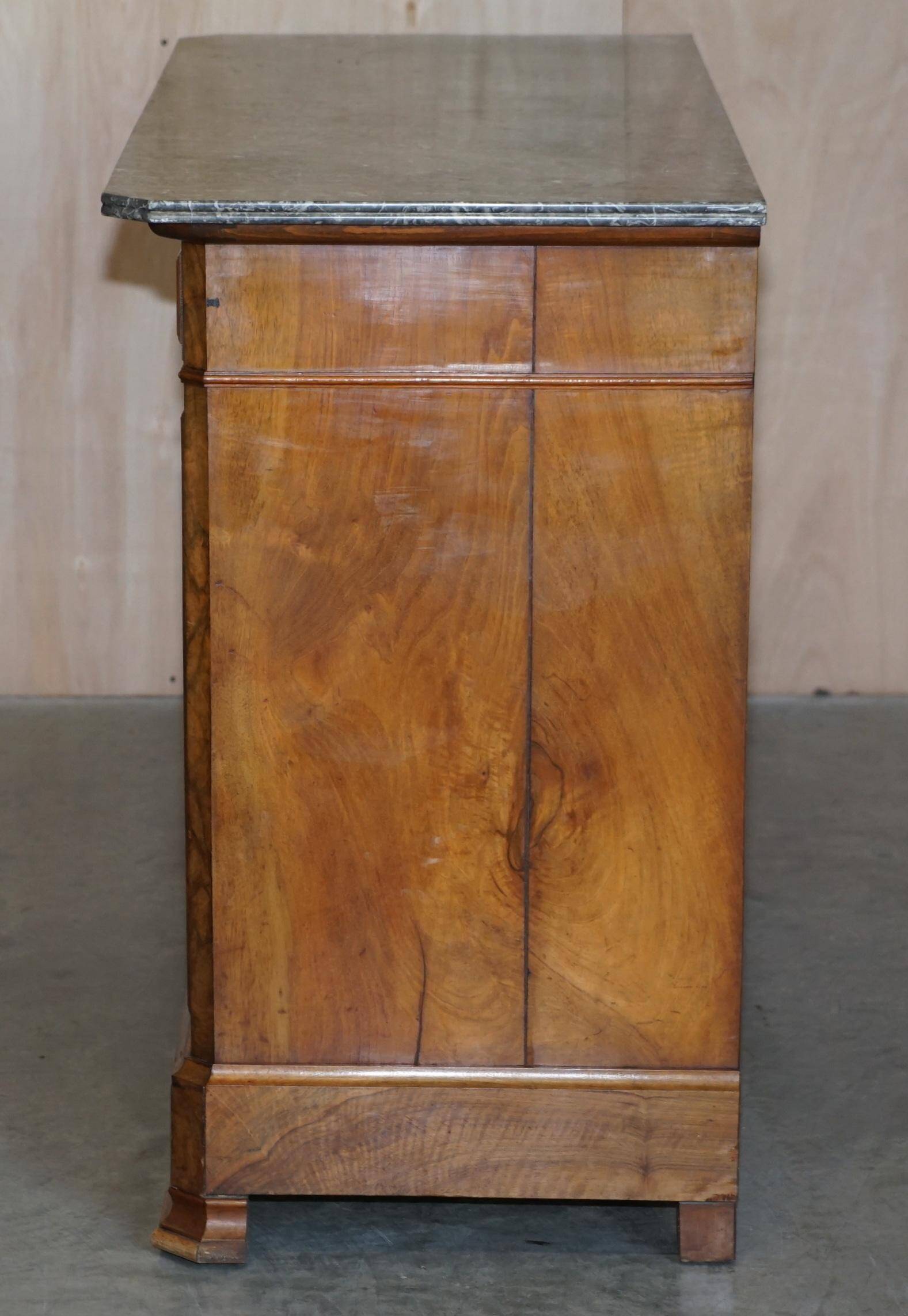 Antique walnut commode from 1860 with a marble top and original key.