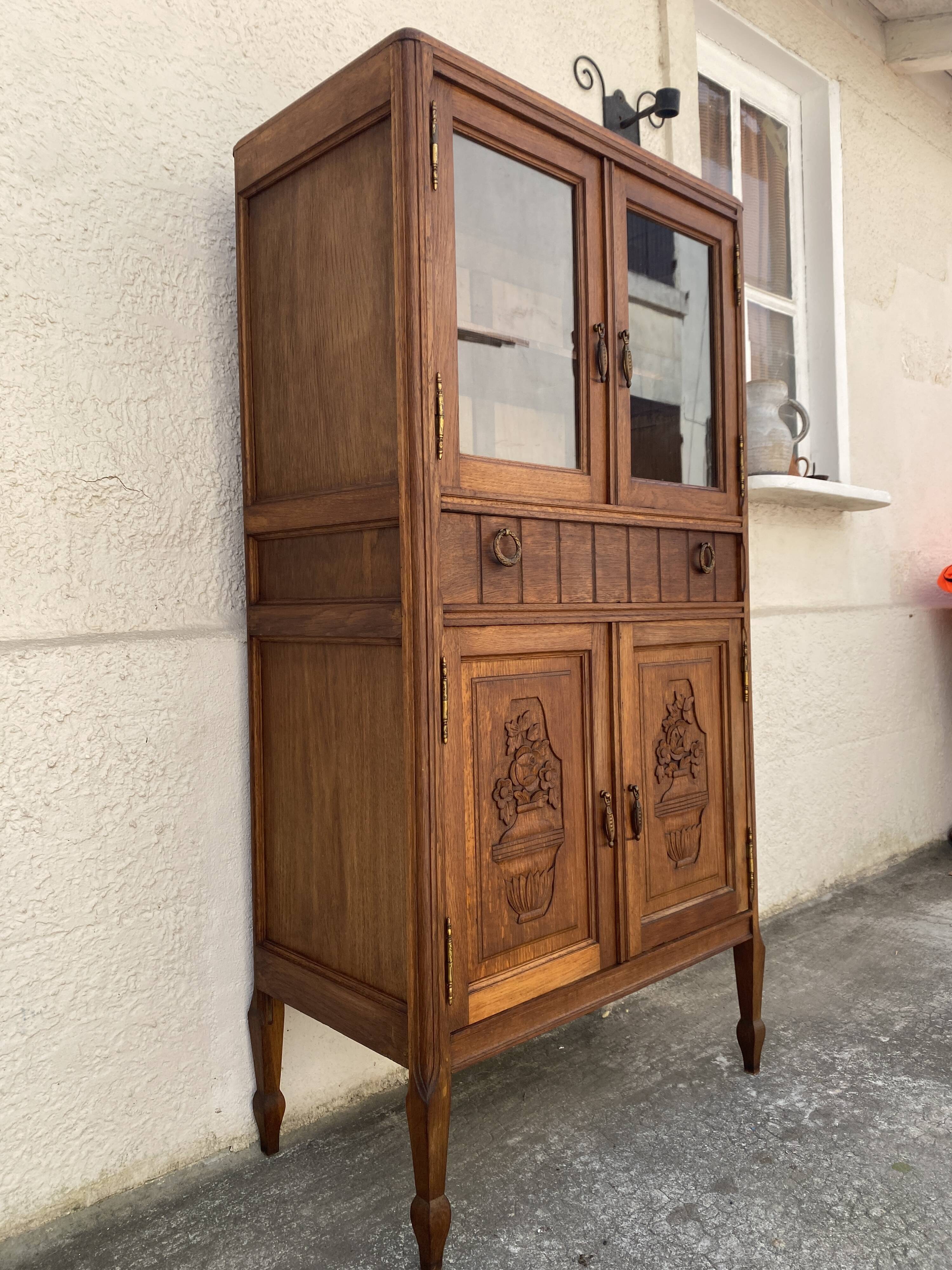Old small glass display cabinet from the early 20th century.