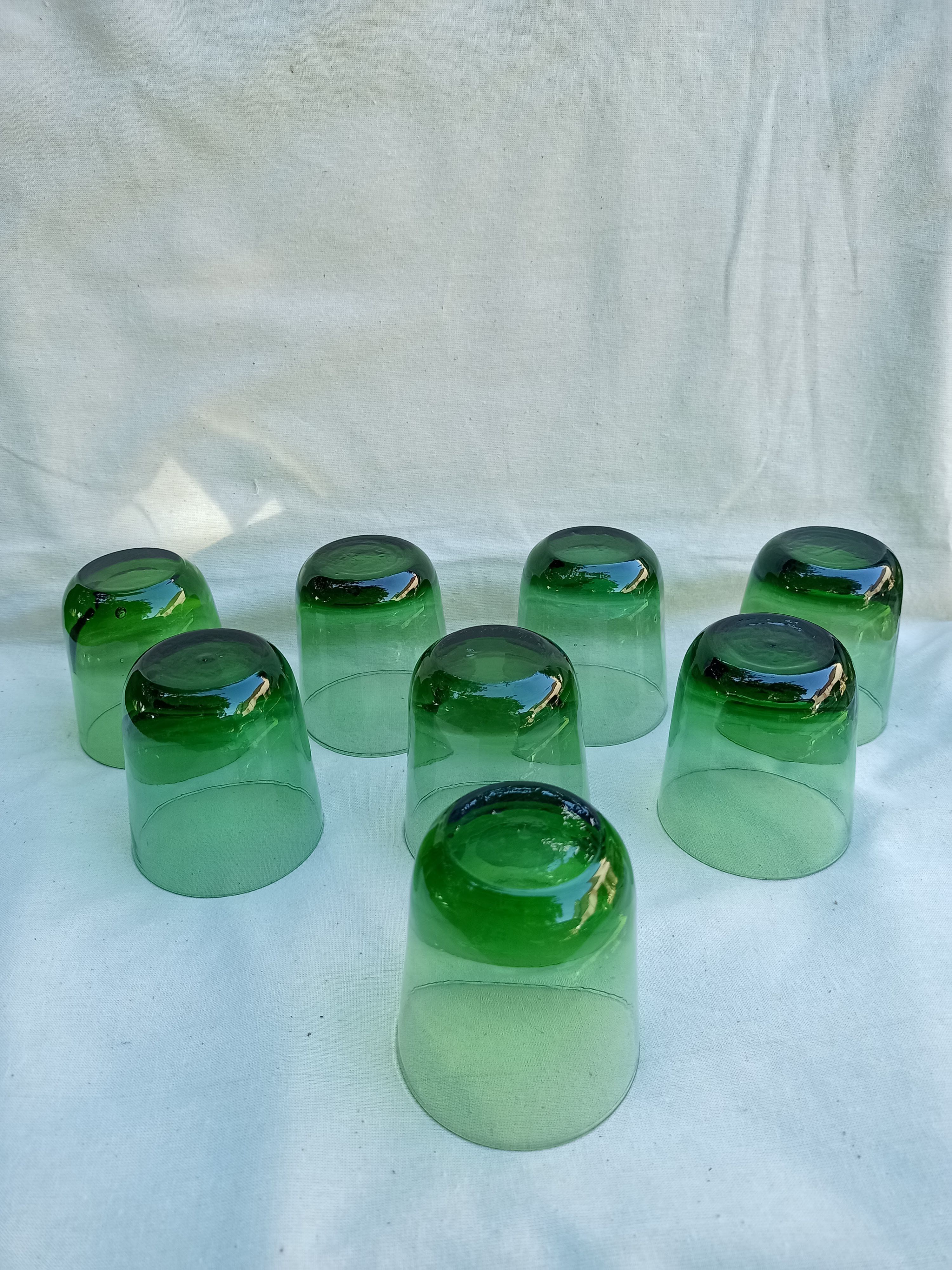 Vintage glasses in slightly bulled green glass