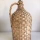 Demijohn old dress in vintage rattan
