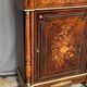 Elegant Napoleon III style commode with fine marquetry, gilded bronze mounts, and a marble top.