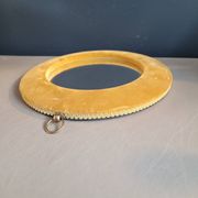 Vintage mirror with mustard velvet frame