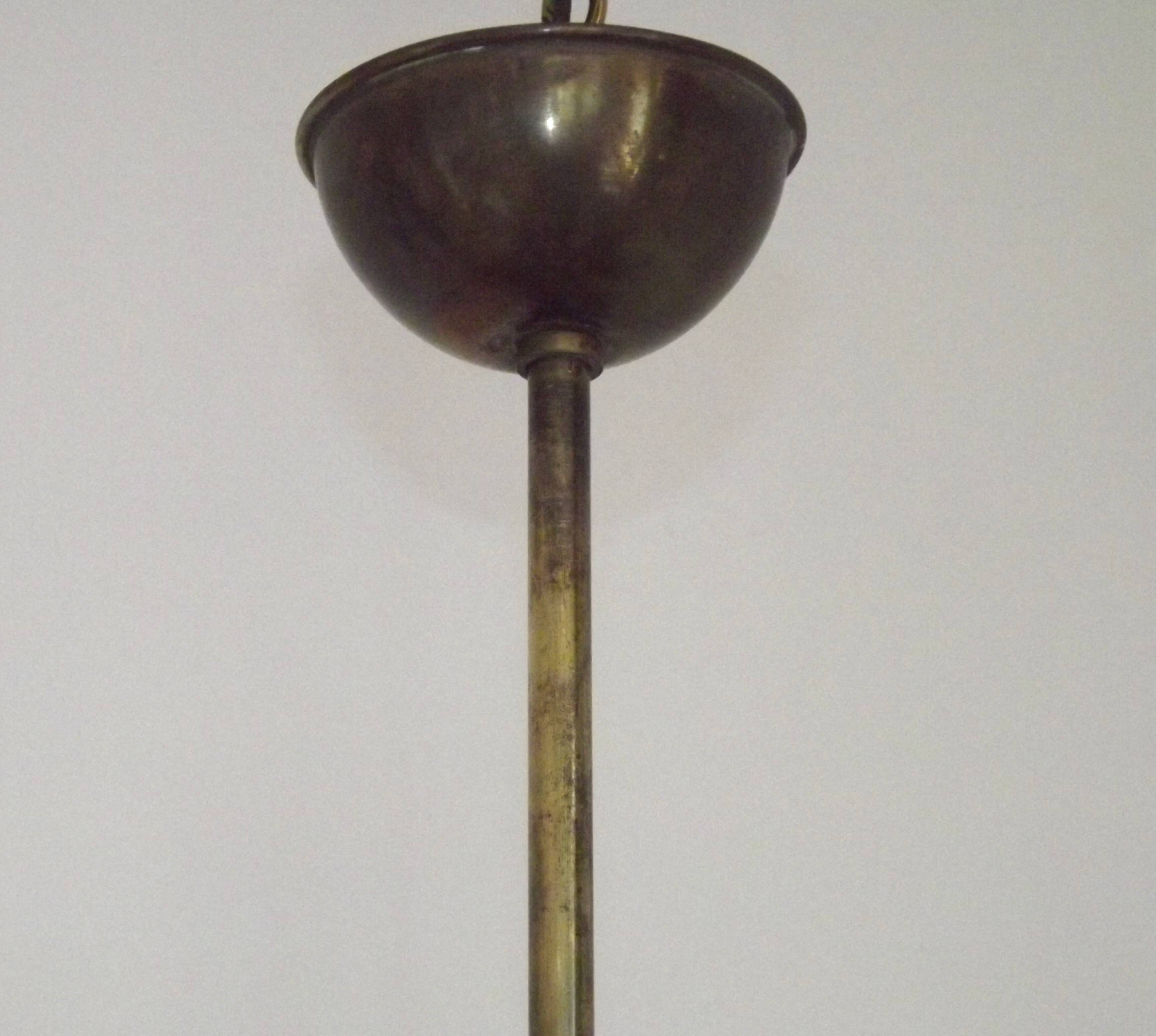 French vintage retro chandelier with 4 lights in brass and bronze with cut glass shades.