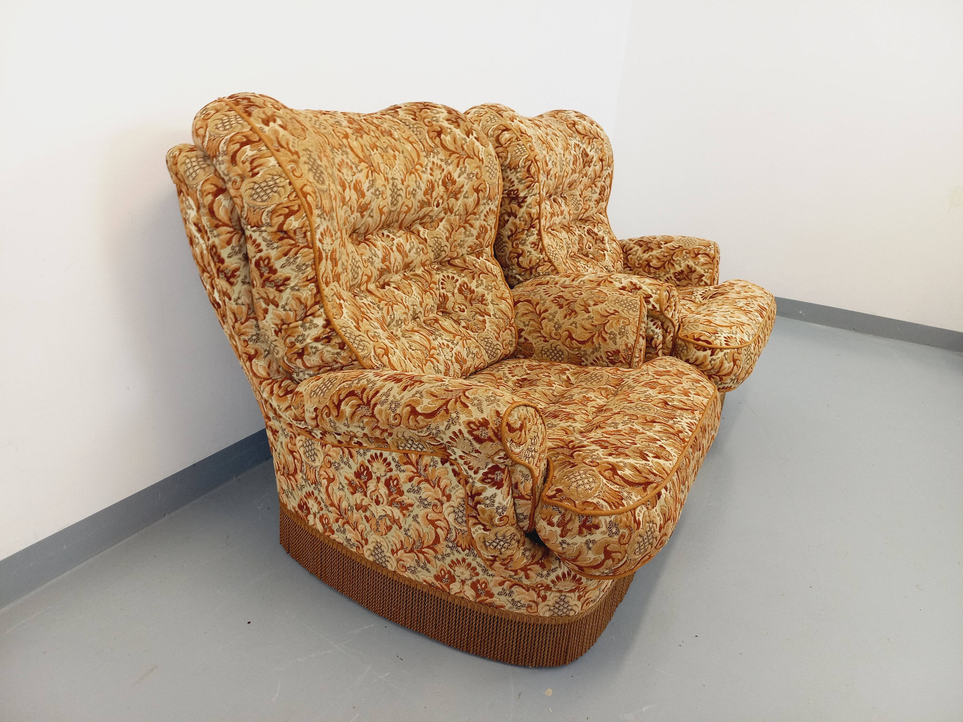 Set of 2 vintage armchairs in floral fabric with fringes from the 60s 70s