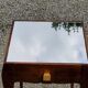 Vintage side table from the 30s/50s in beech and mirror top