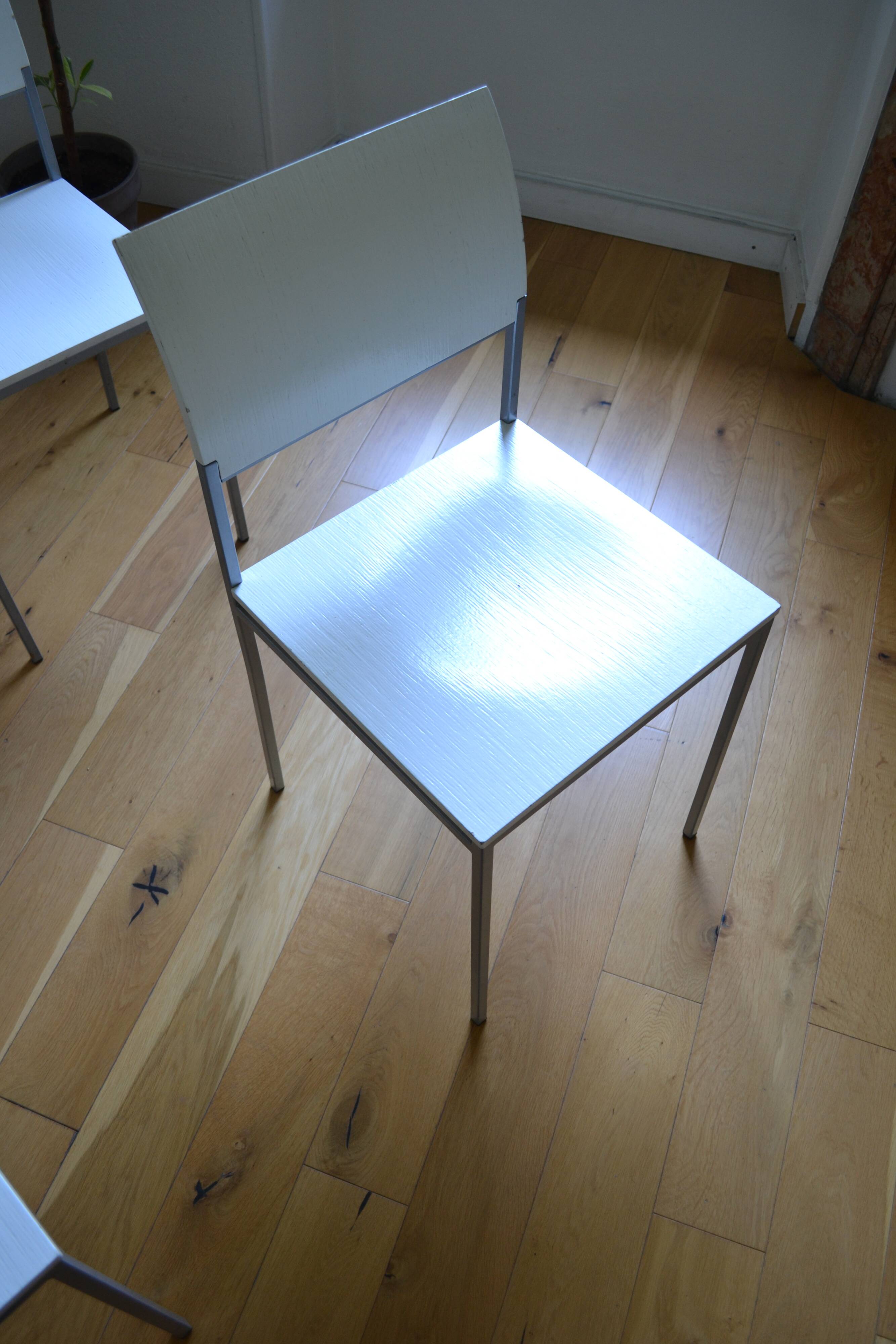 Set of 4 vintage metal and wood chairs from the 1990s.
