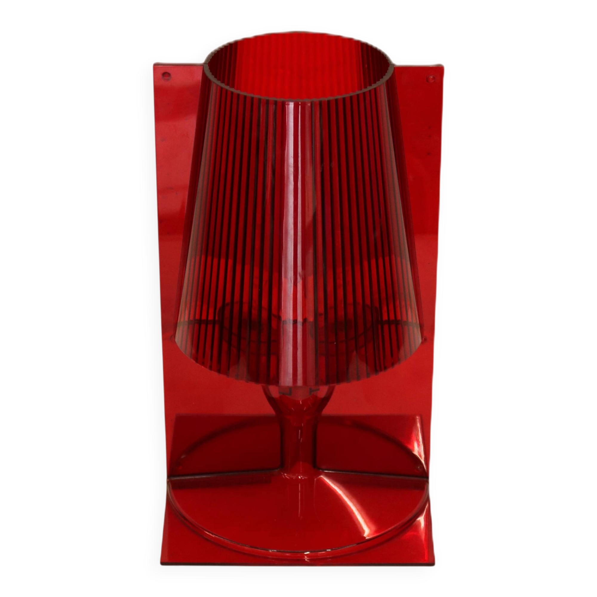 Red plastic Kartell table lamp - model Take - design by Ferruccio Laviani