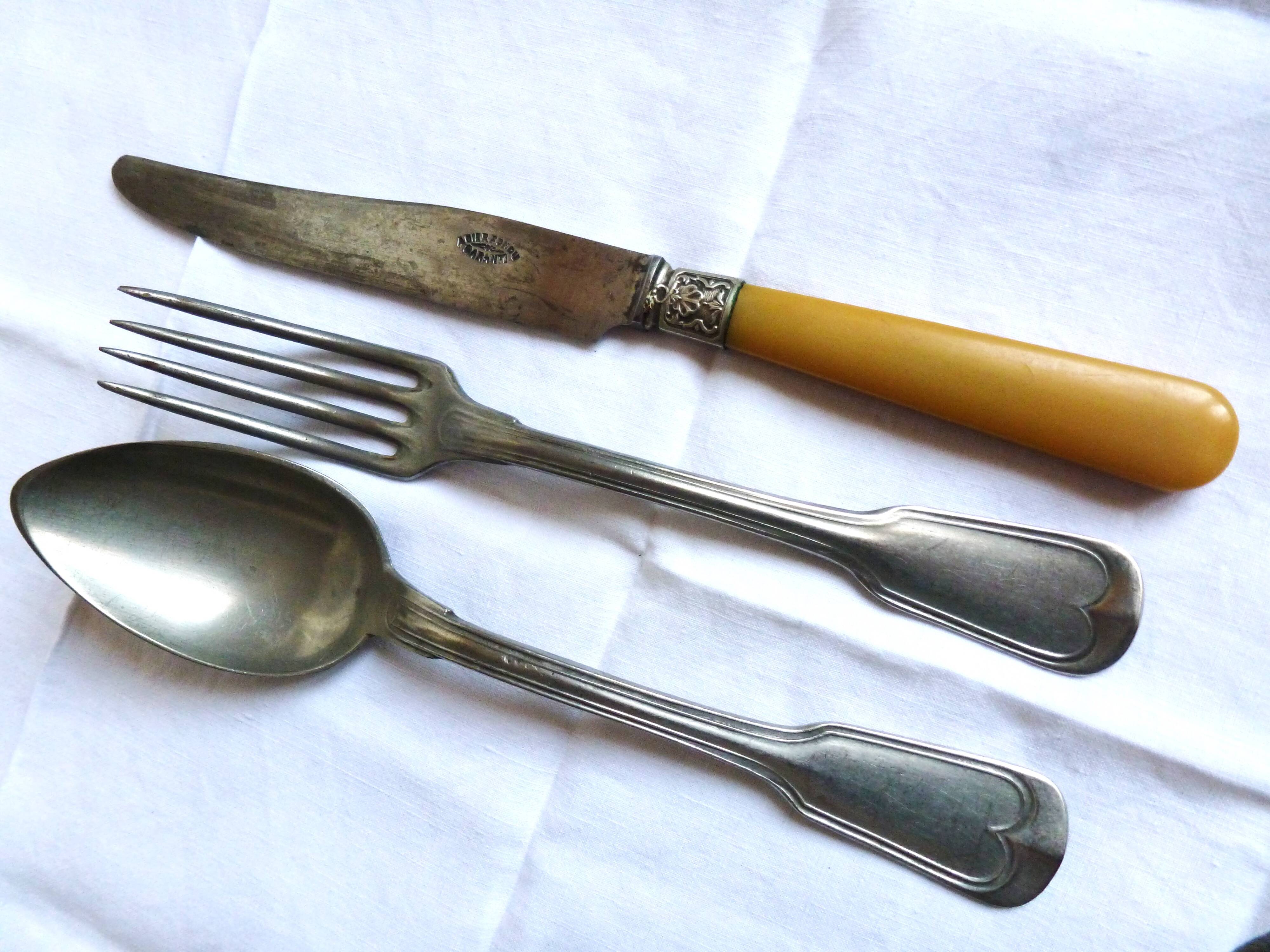 Art Deco cutlery, spoons, forks and table knives.