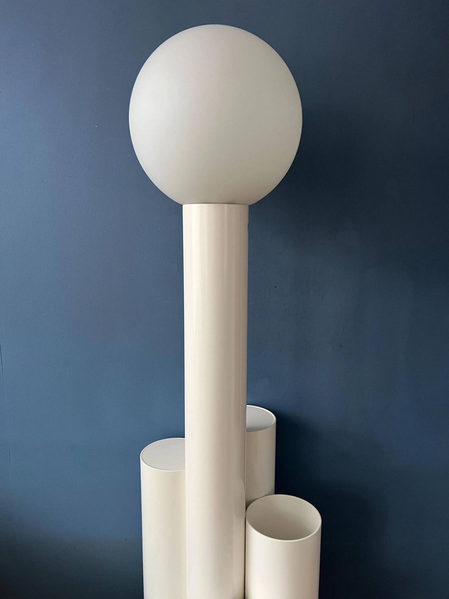 White floor lamp "Close Encounter" and plant stand by Kerst Koopman
