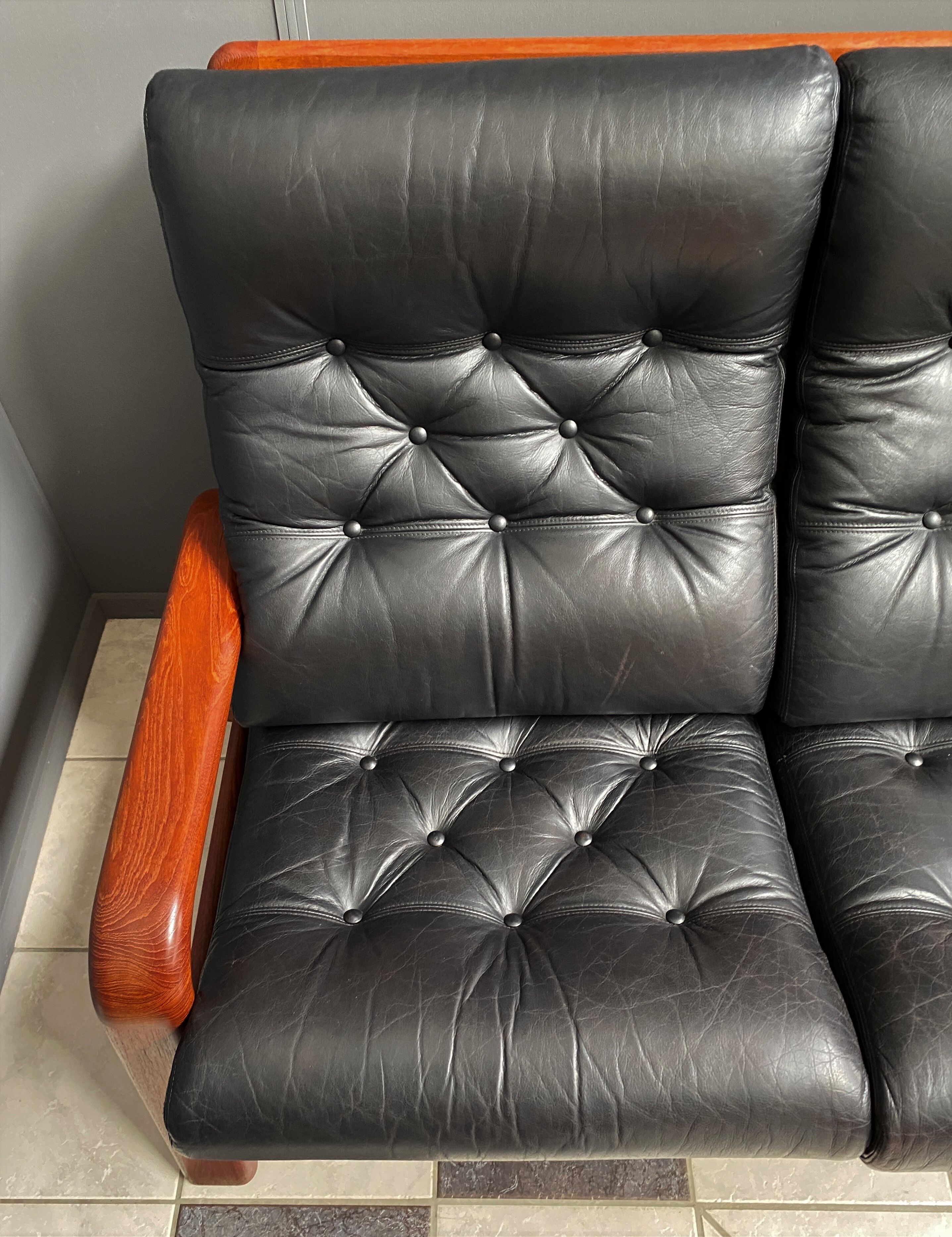 Teak and Black Leather 32 seat sofa by HS Denmark 1970s