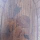 Oval bedside table from the Transition period in marquetry and bronze.