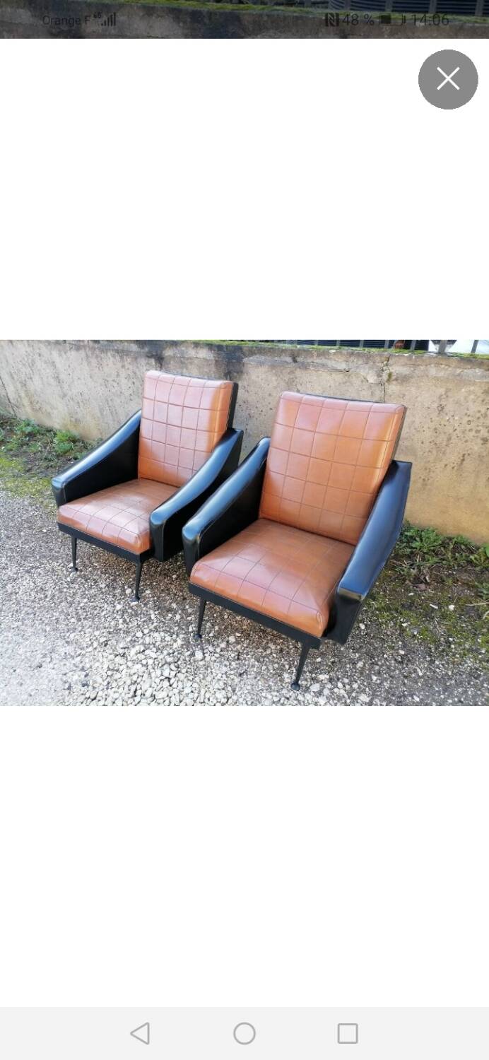 Pair of faux leather armchairs