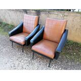 Paire de fauteuils en simili cuir