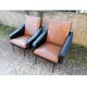 Paire de fauteuils en simili cuir